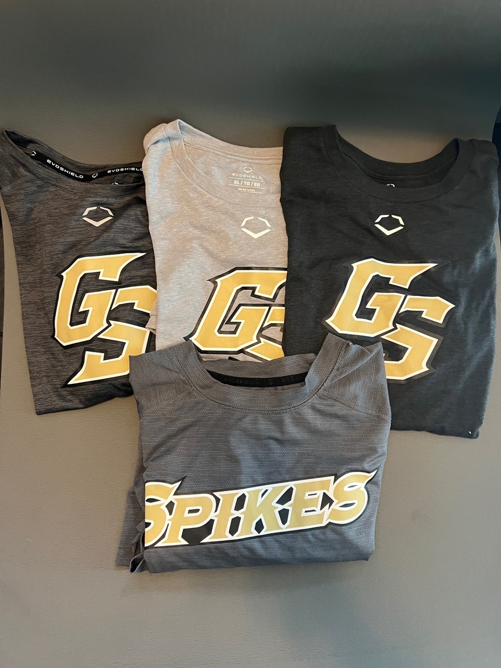 Lot of evoshield Golden Spikes shirts- (3) ladies (1) men’s
